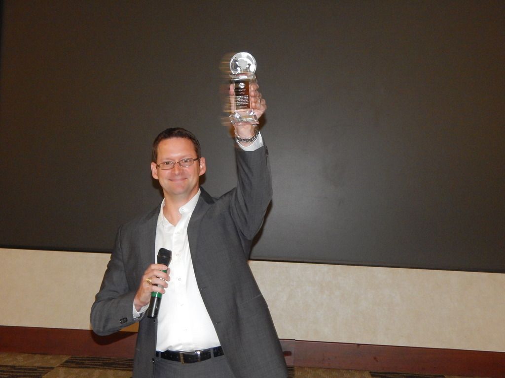 SVP Laurence Therivel receiving award